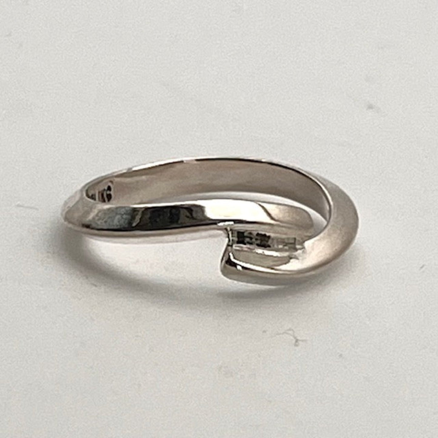 Handmade Sterling Silver ring on a light gray background
