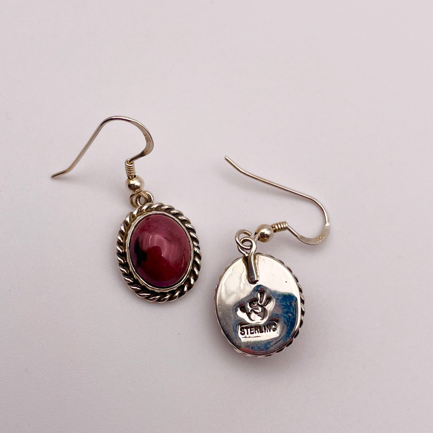 Sterling Silver French Hook earrings set with Rhodonite stones - front and back view featuring Caleb Calles' signature stamp 
