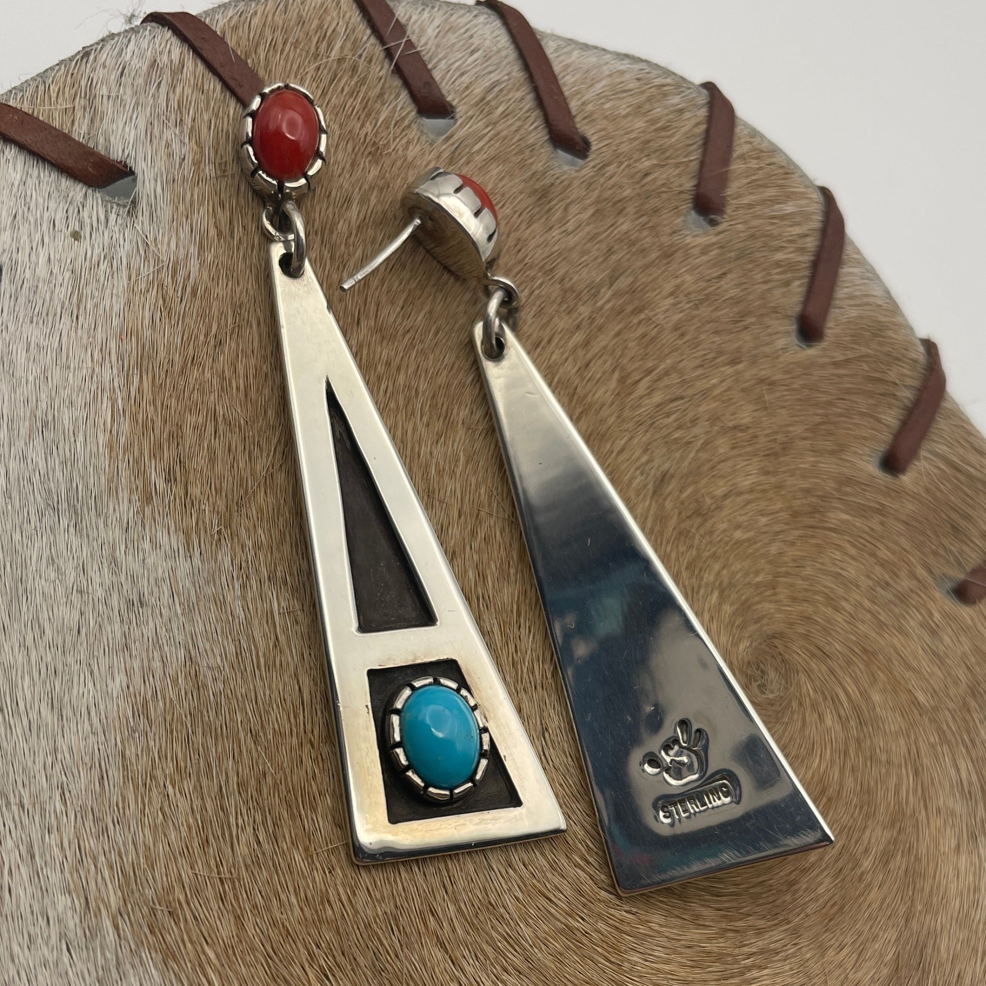 Sterling Silver geometric post  earrings featuring natural Sleeping Beauty Turquoise and Mediterranean Coral Reverse of one earring with artist's stamp and Sterling stamp