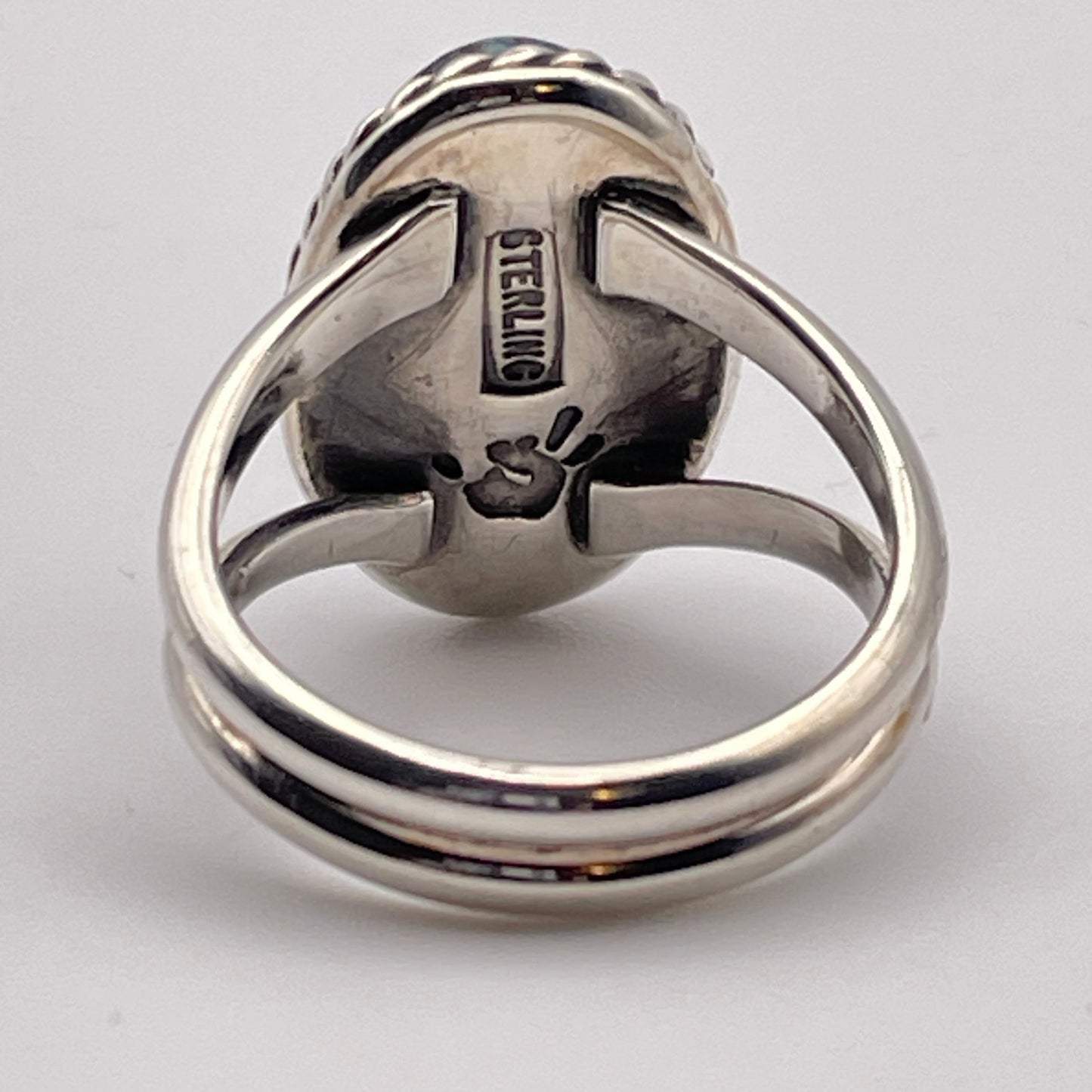 Back view of Sterling Silver ring with STERLING and Caleb Calles' artist's stamp 