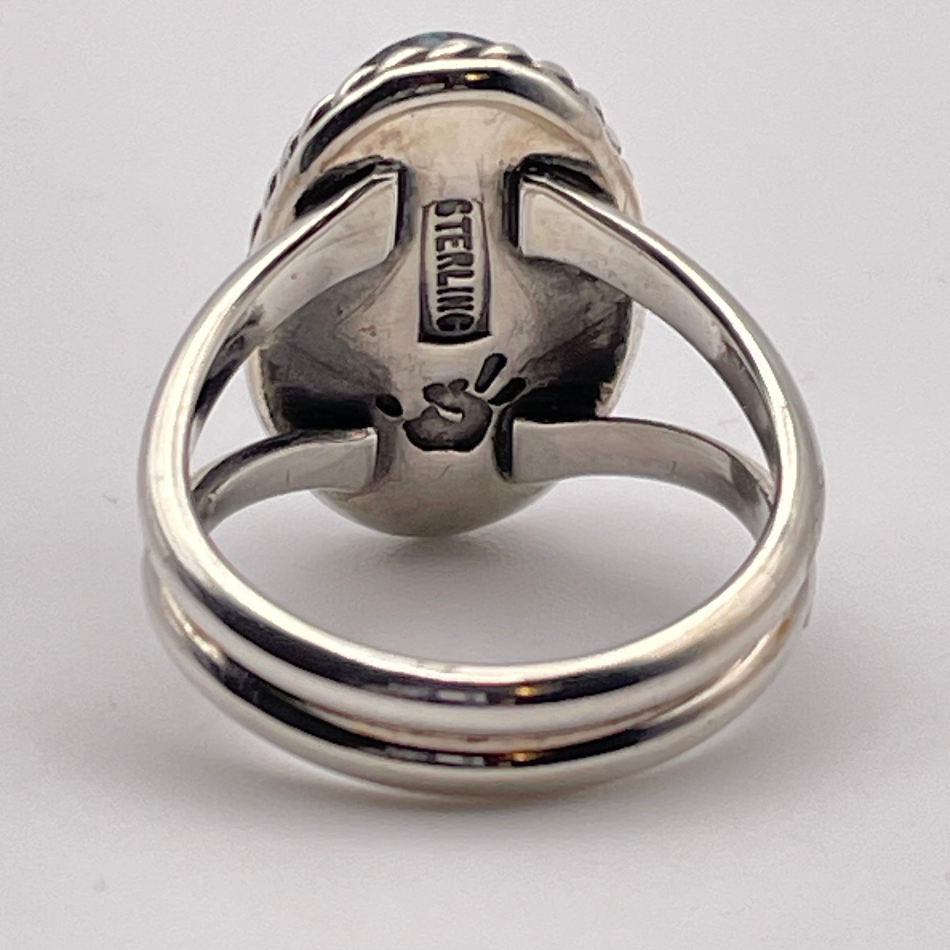 Back view of Sterling Silver ring with STERLING and Caleb Calles' artist's stamp 