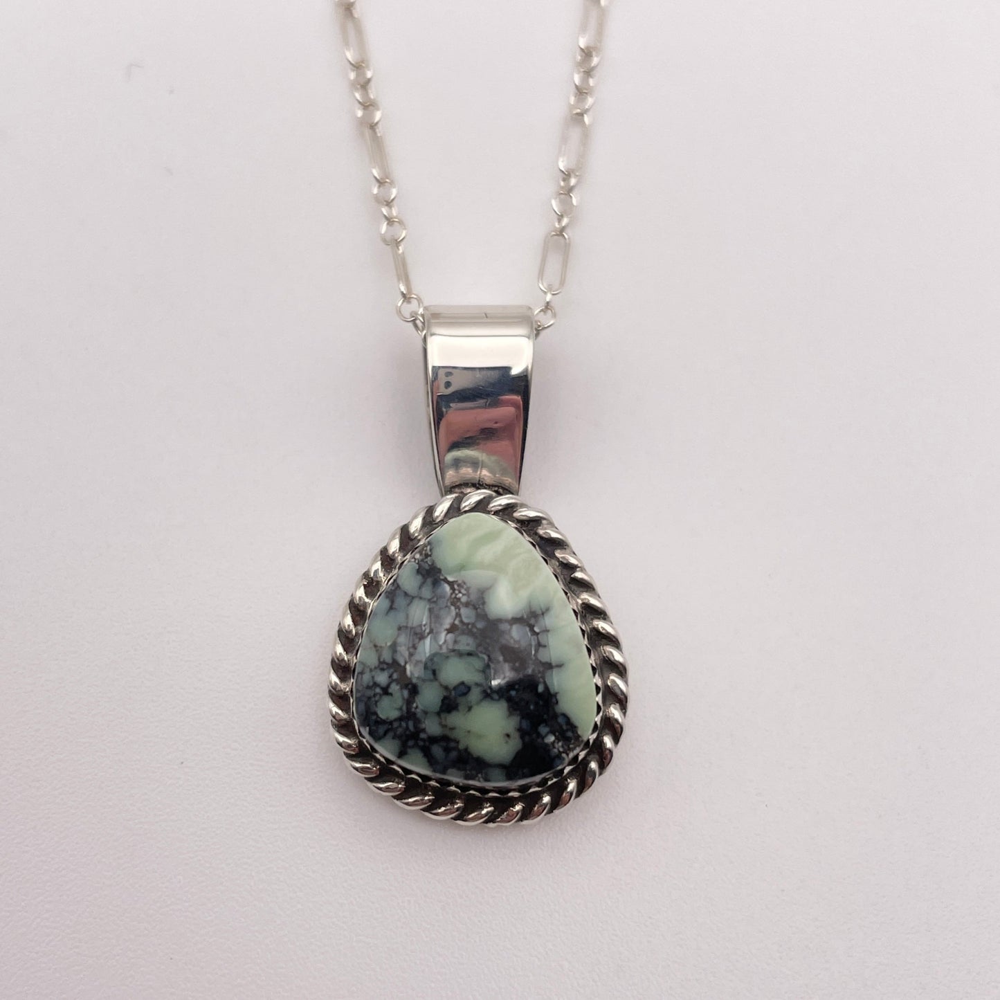Poseidon Variscite stone pendant set in Sterling Silver shown on Sterling Silver chain. 