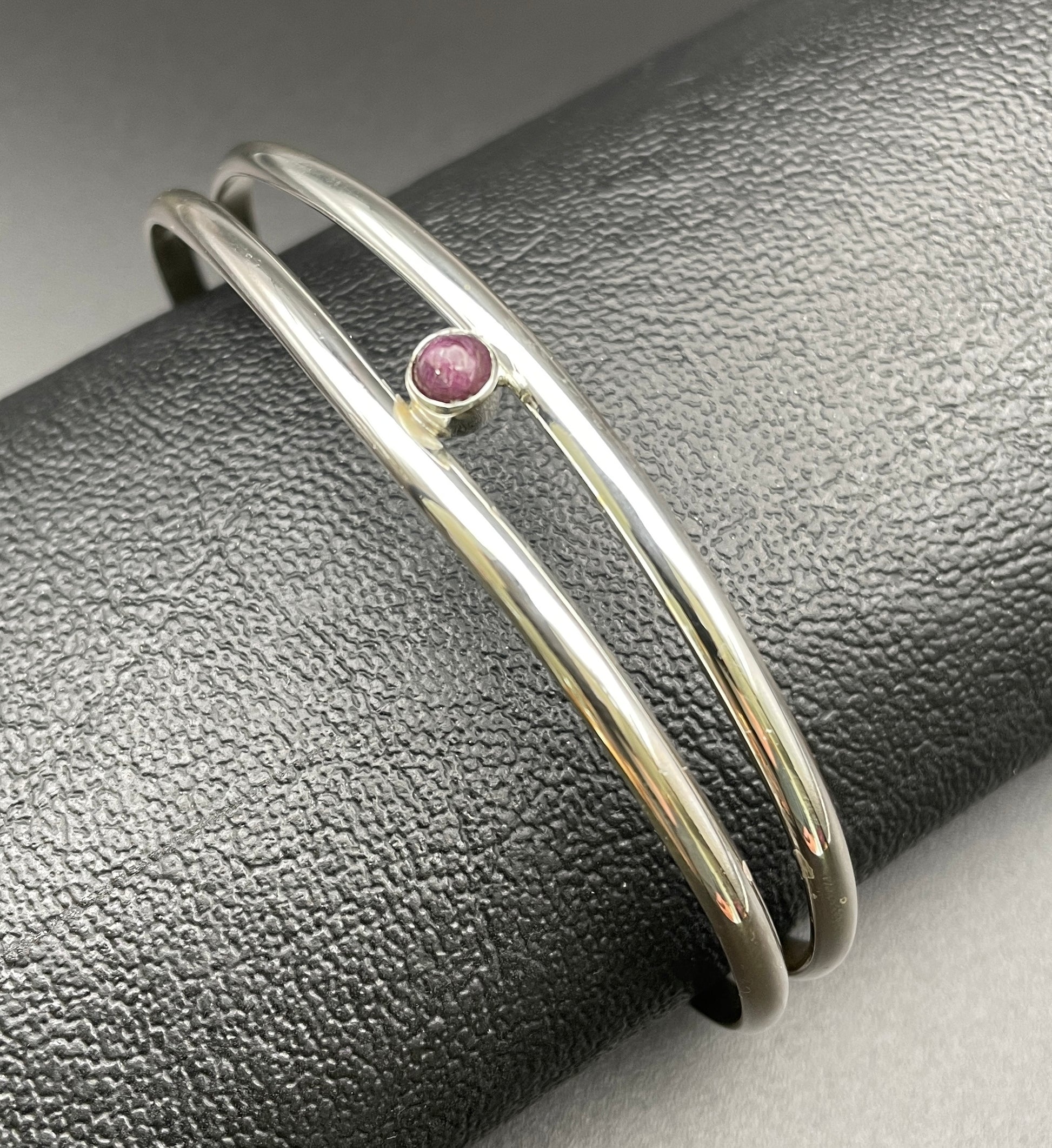 Sterling Silver Lady's cuff bracelet with Ruby stone July Birthstone handmade by Arizona native artist Caleb Calles