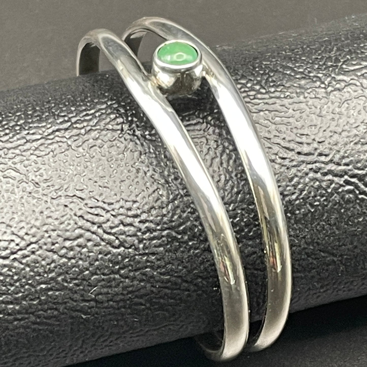 Sterling Silver baby bracelet handmade by Arizona native artist Caleb Calles featuring a genuine birthstone