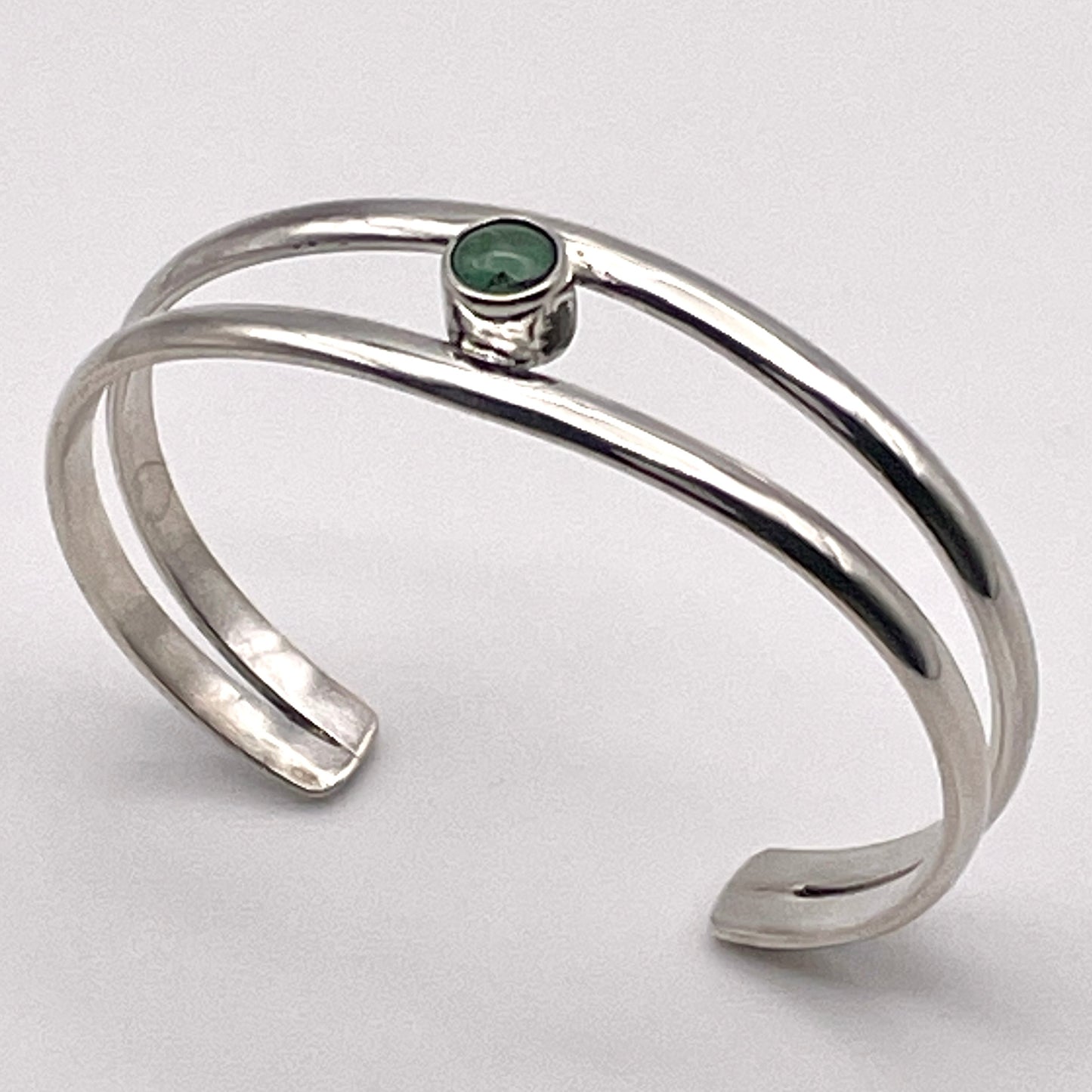 Sterling Silver baby bracelet featuring a genuine birthstone handmade and designed by Caleb Calles - Broken Hand Creations