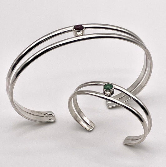 Sterling Silver birthstone bracelets - shown with a baby bracelet and an adult bracelet Handmade by artist Caleb Calles