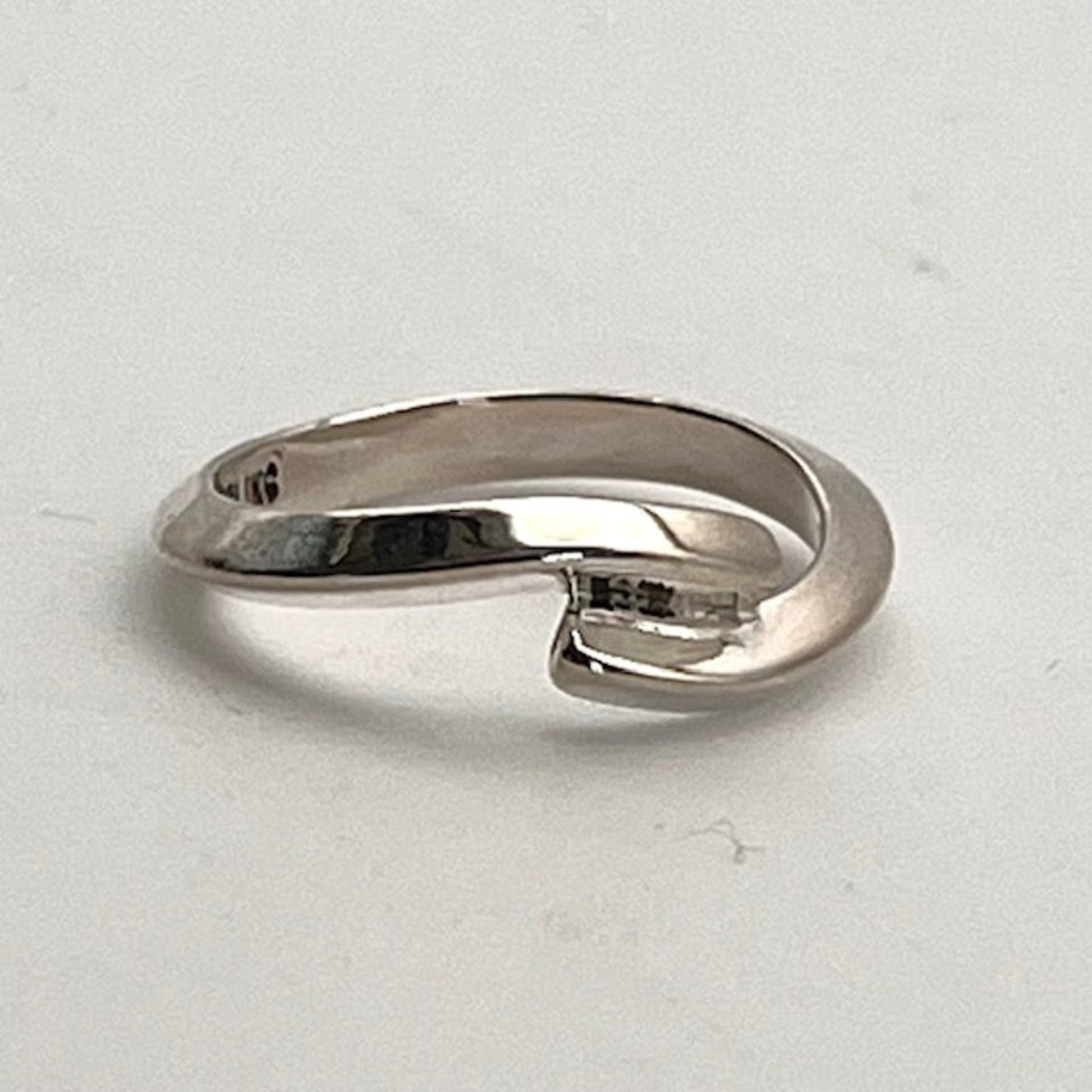Handmade Sterling Silver ring on a light gray background